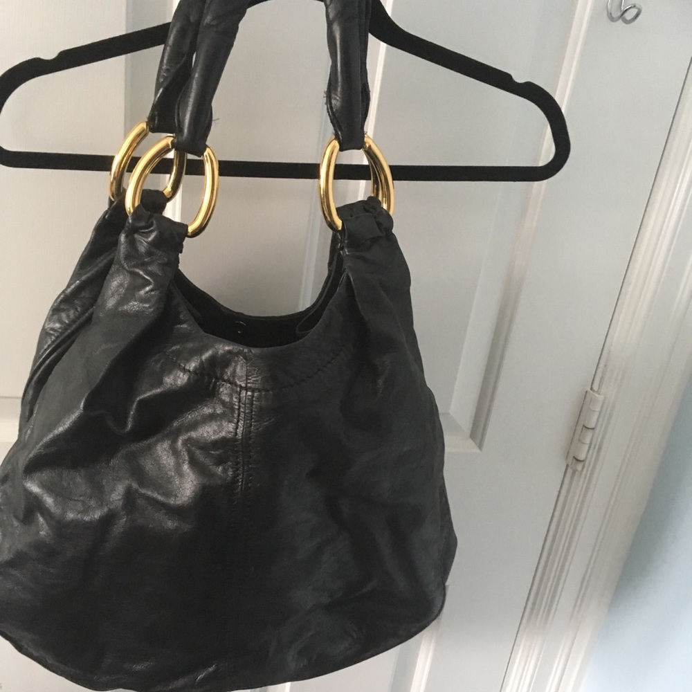 Designer leather Miu Miu bag gently used